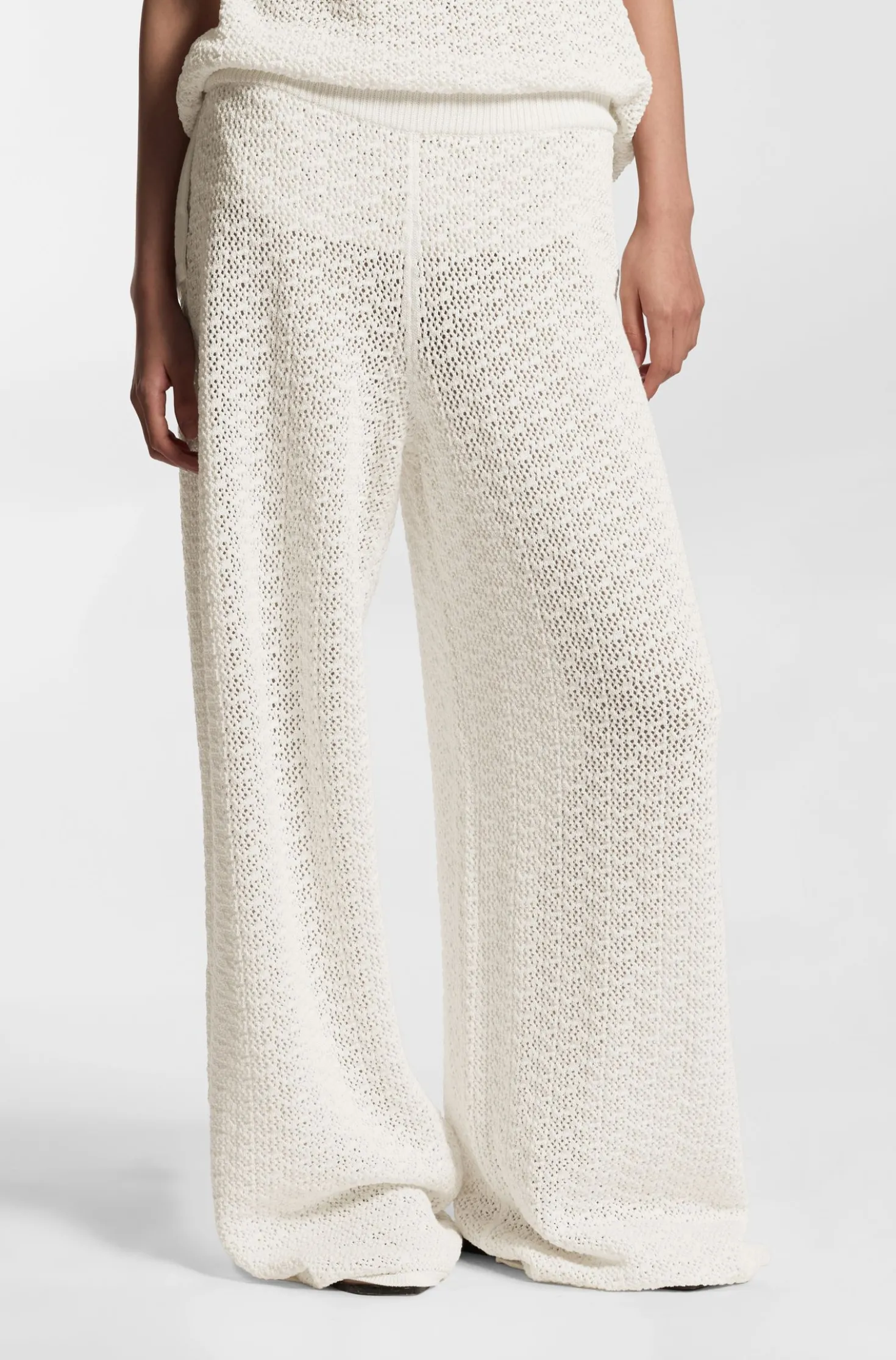 Cotton trousers with micro-lace structure