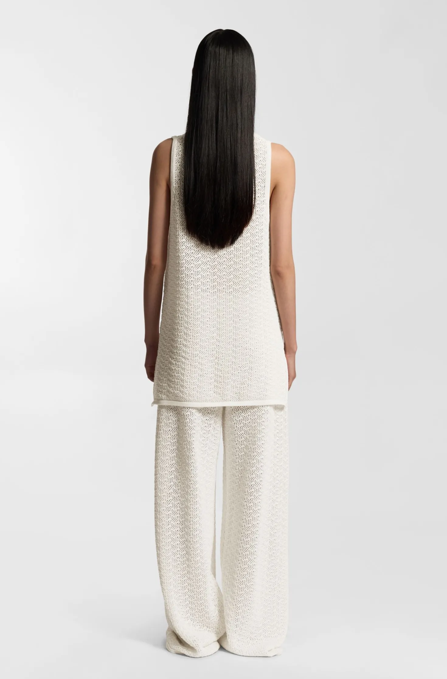 Cotton trousers with micro-lace structure