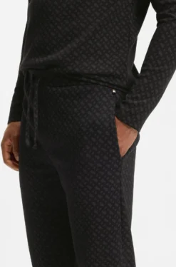 Cuffed pyjama bottoms in monogram-print waffle fabric