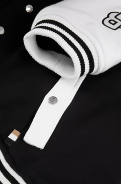 Dog bomber jacket with embroidered logo