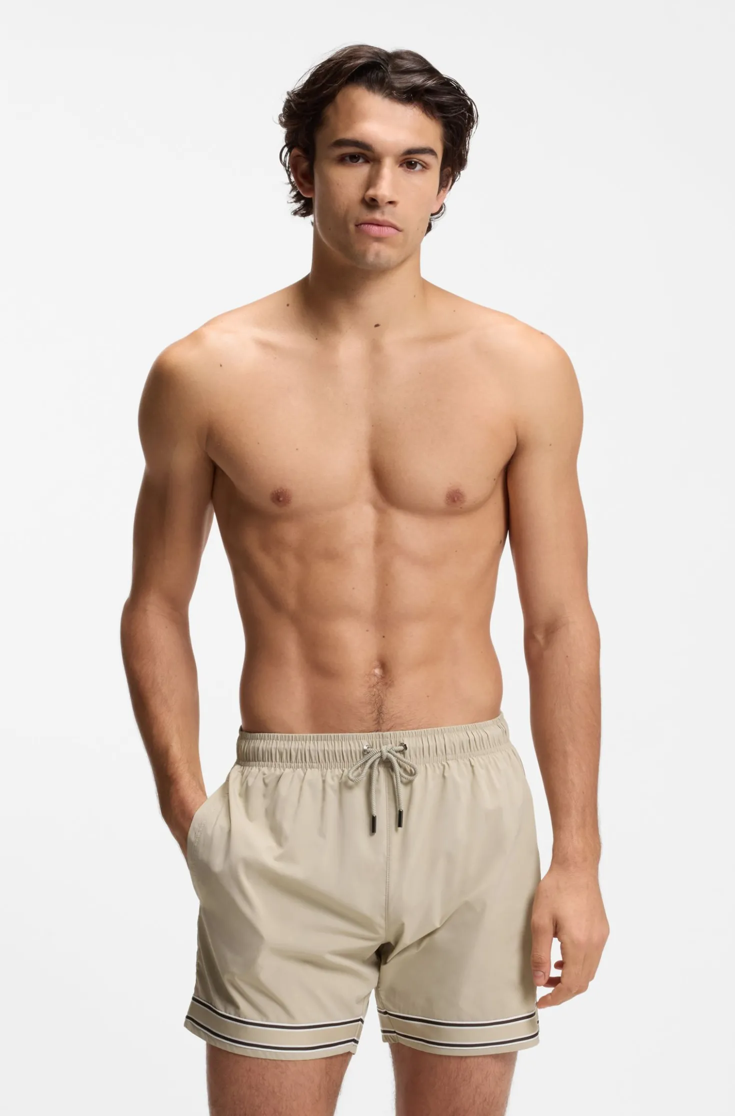Drawstring swim shorts in stretch fabric with tape trim