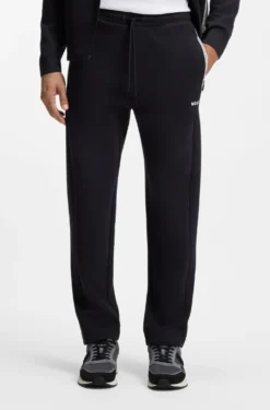 Drawstring trousers in cotton-blend jersey