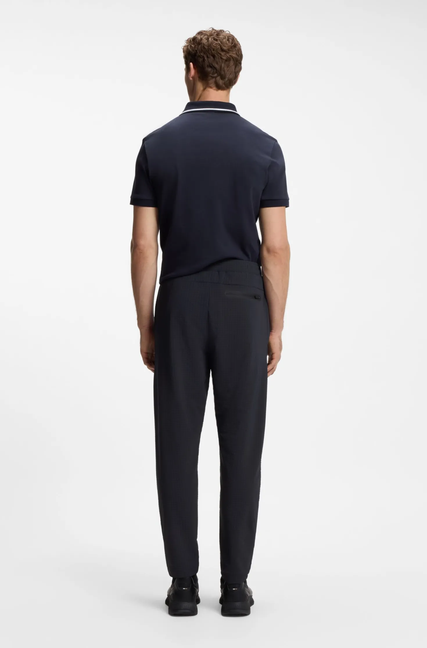 Drawstring trousers in stretch waffle fabric with framed zip