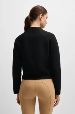 Equestrian cardigan with concealed closure