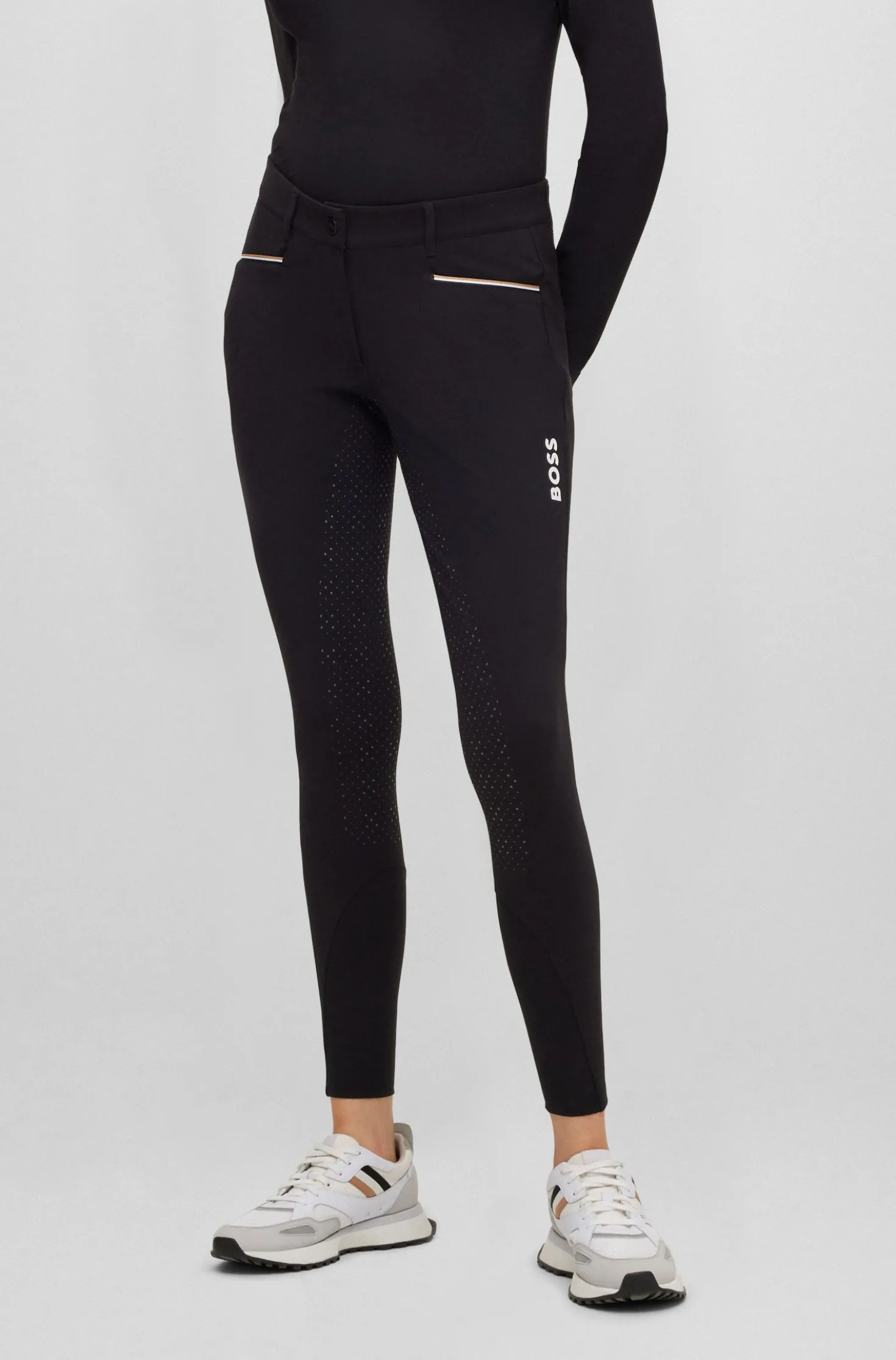 Equestrian full-grip breeches in power-stretch material