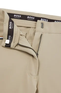 Equestrian knee-grip breeches in power-stretch material