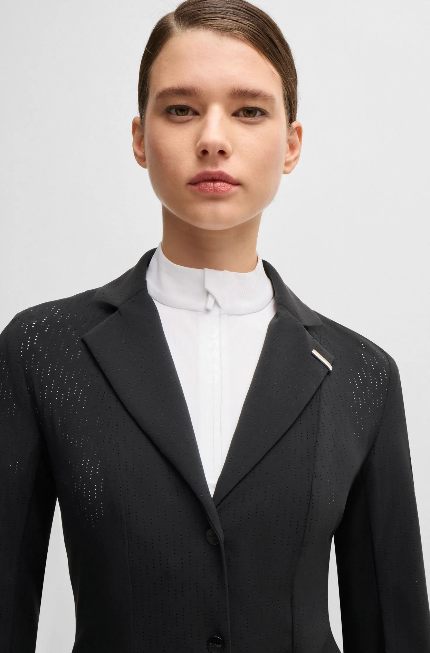 Equestrian show jacket in perforated material