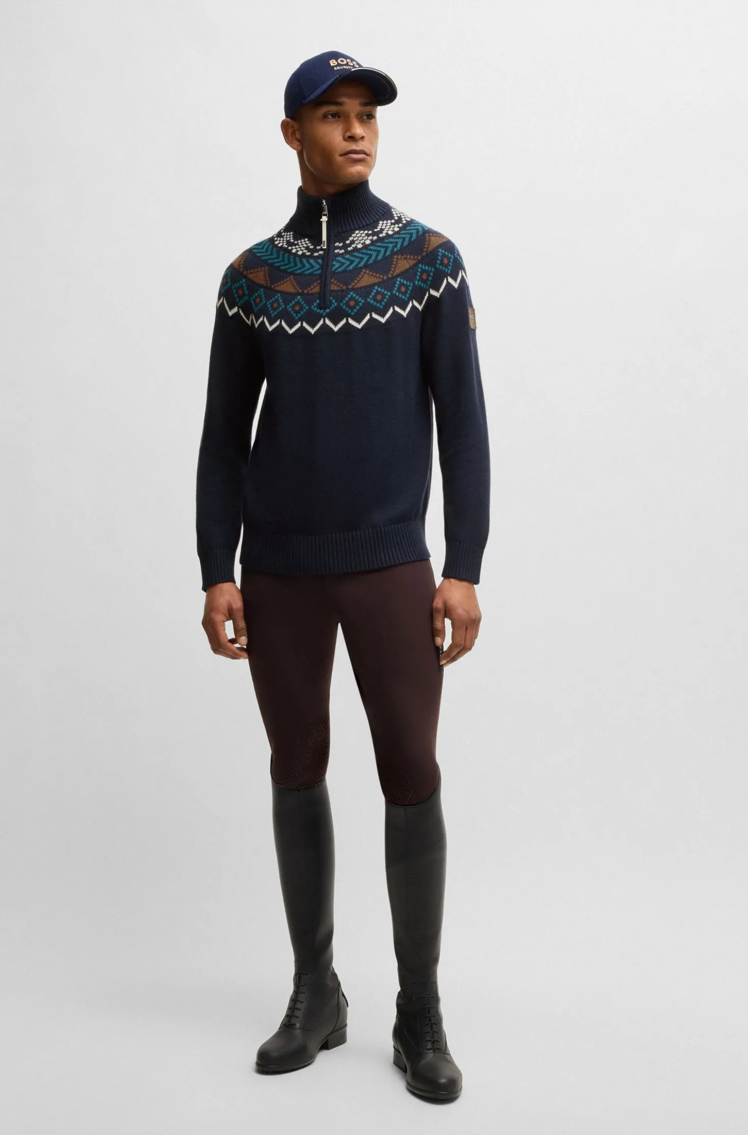 Equestrian troyer sweater with knitted pattern