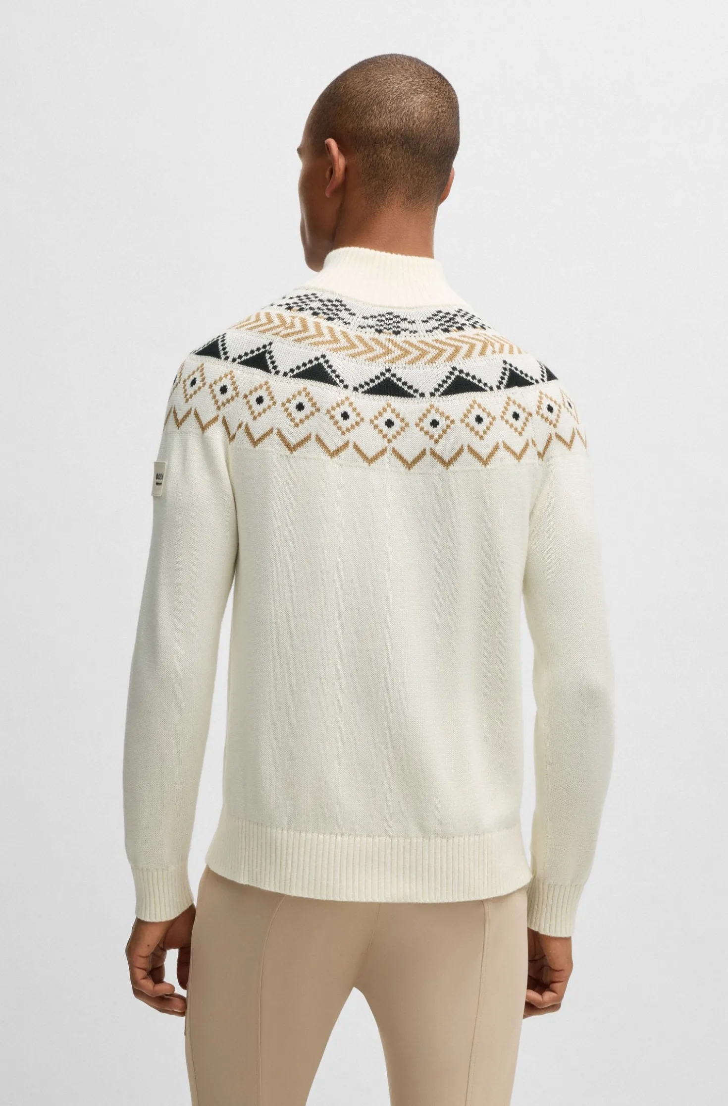 Equestrian troyer sweater with knitted pattern