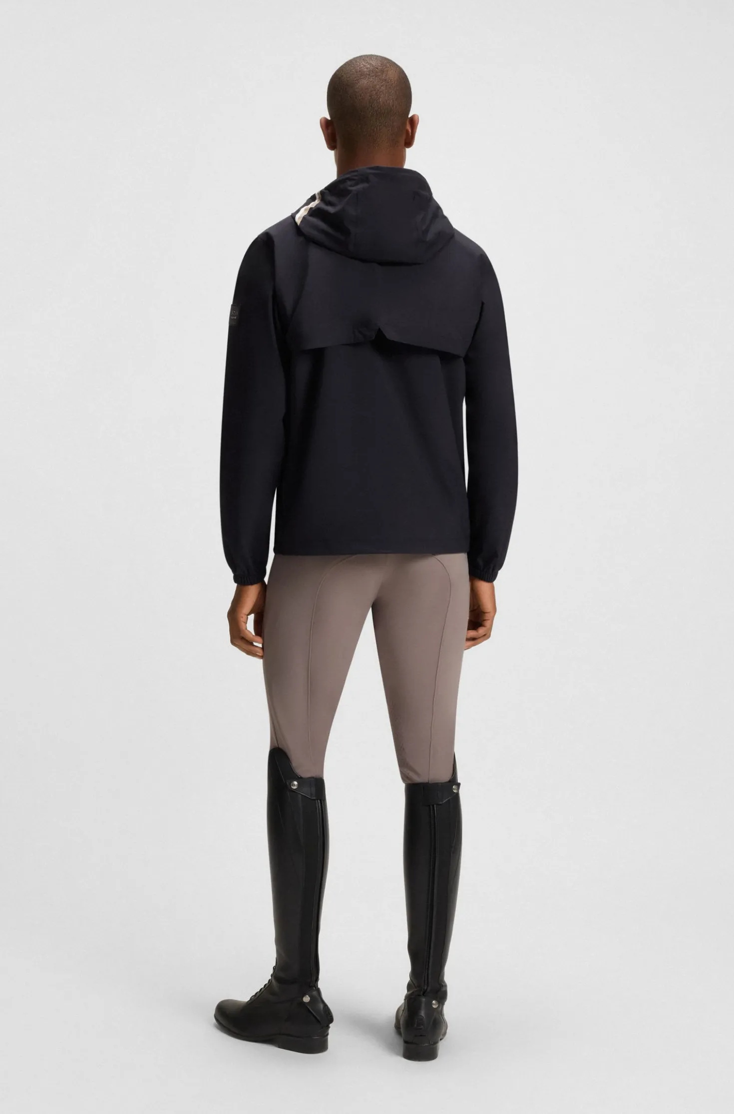 Equestrian waterproof jacket with adjustable hood