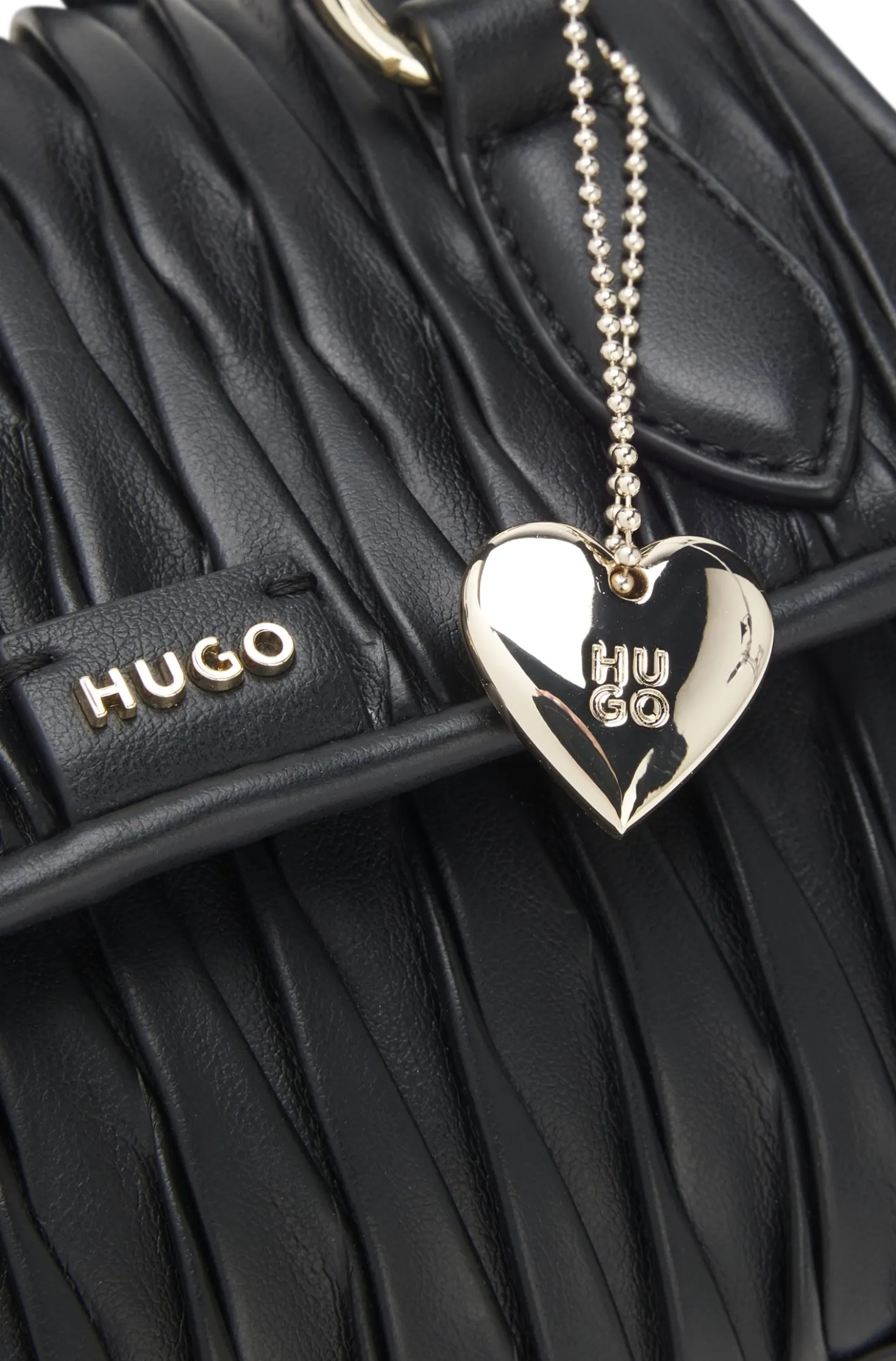 Faux-leather handbag with heart charm