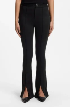 Flared-fit trousers with front slits