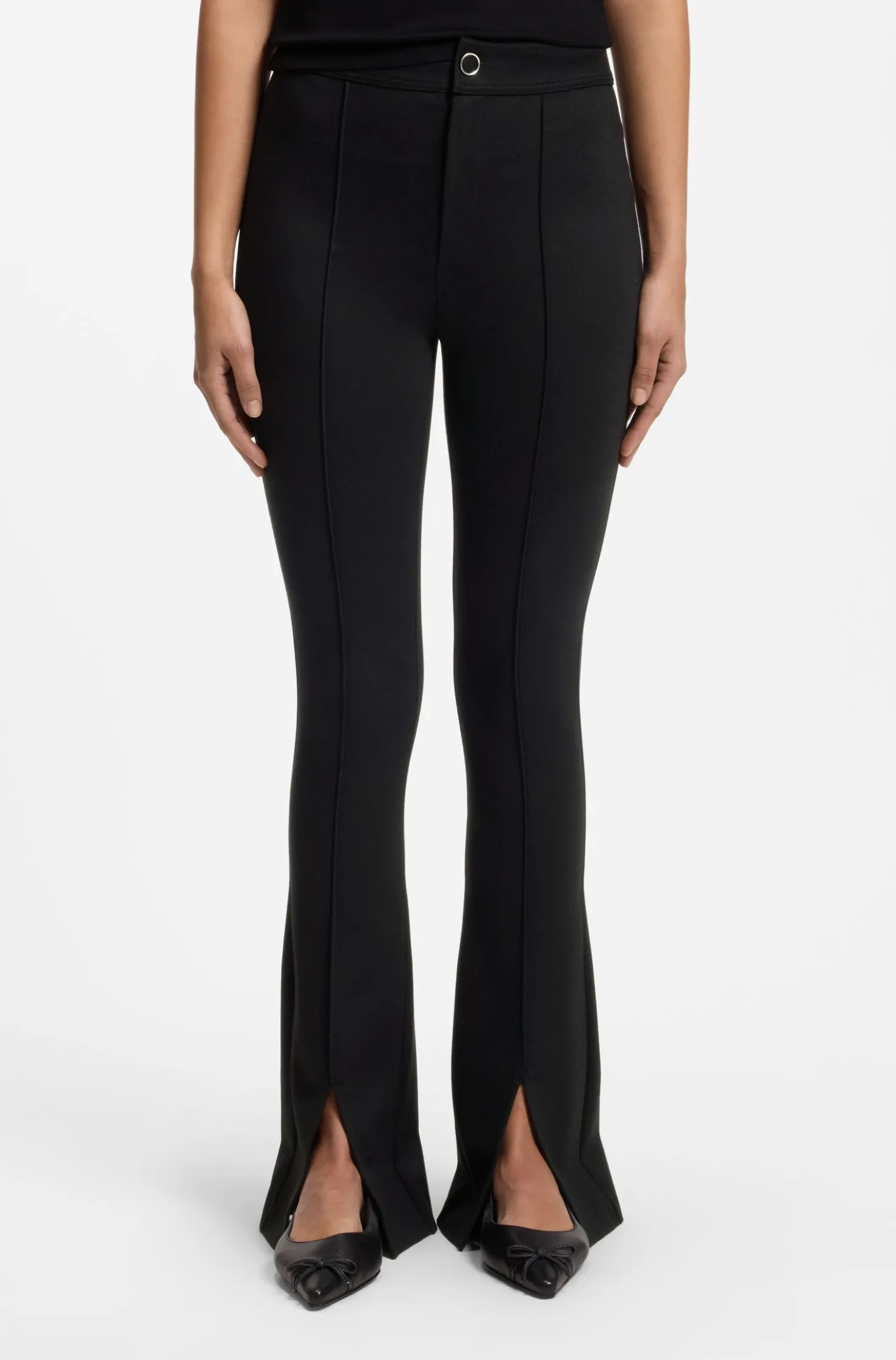 Flared-fit trousers with front slits