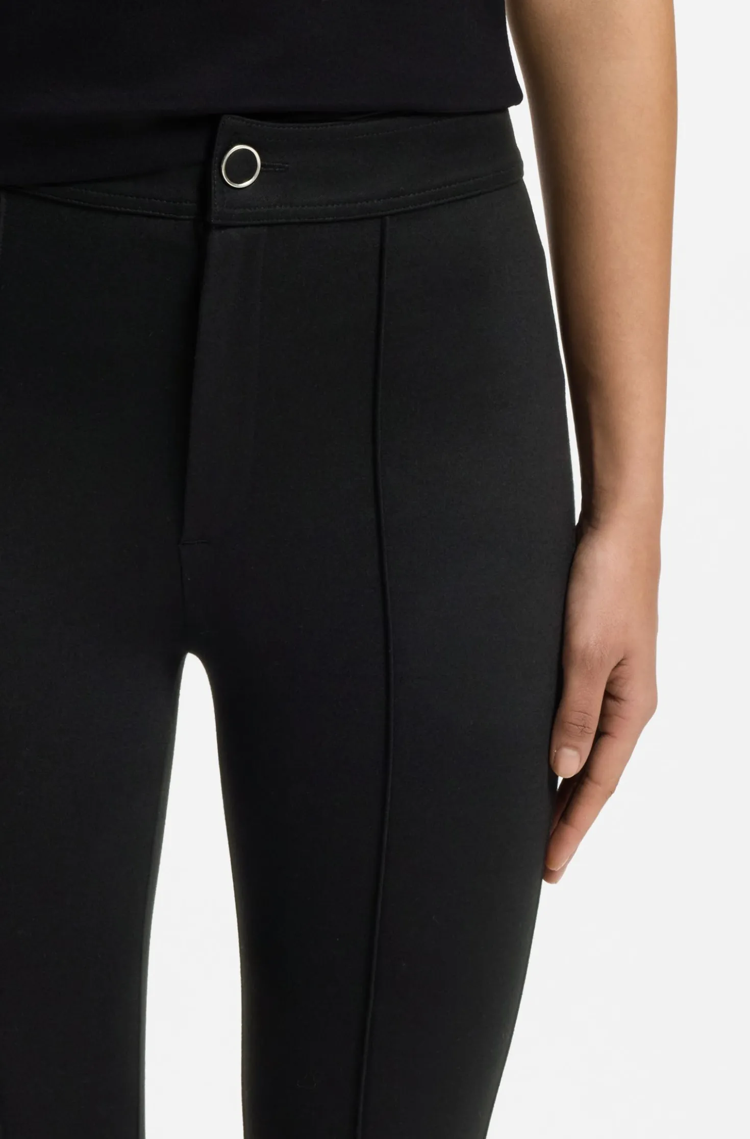 Flared-fit trousers with front slits