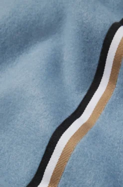 Fleece throw with signature-stripe ribbon