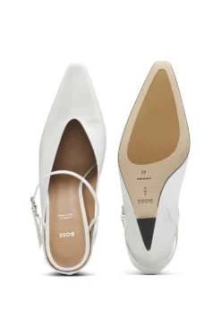 Glossy leather mules with wedge heel and strap