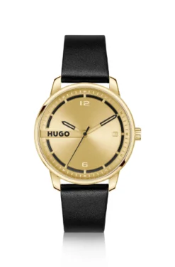 Gold-tone watch with black leather strap