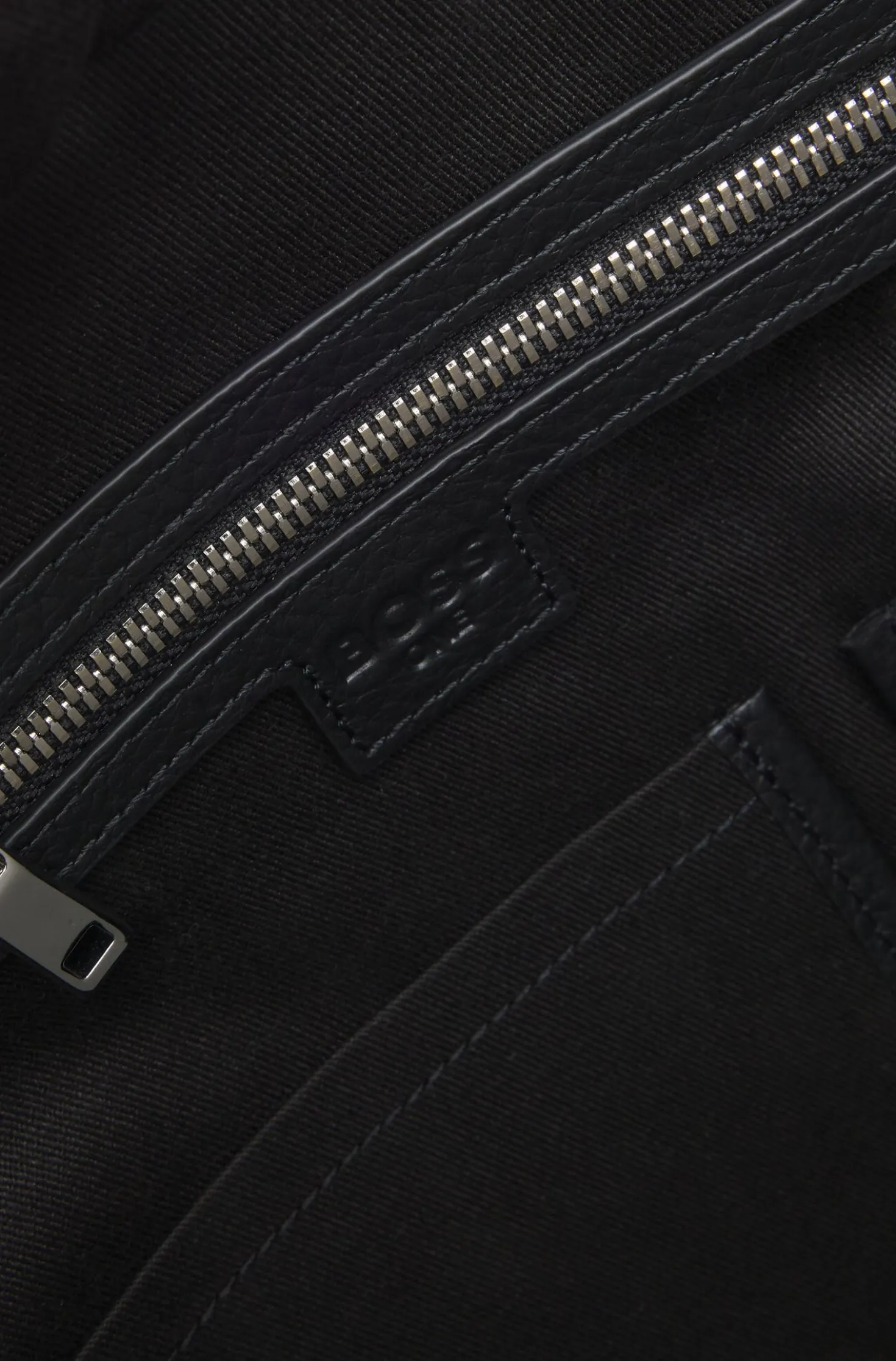 Grained-leather holdall with embossed logo