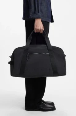 Holdall with wide-set logo detail