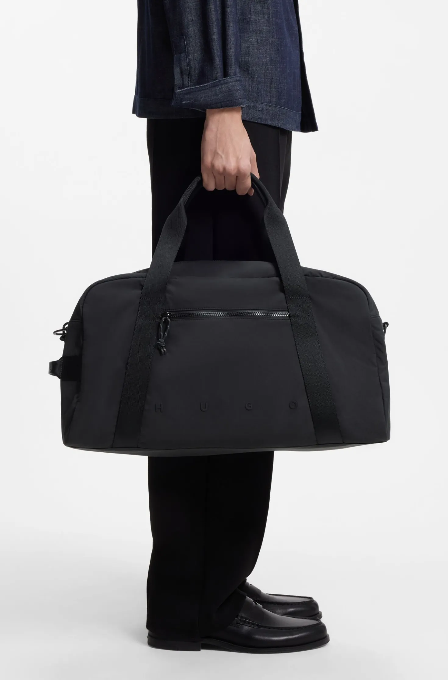 Holdall with wide-set logo detail