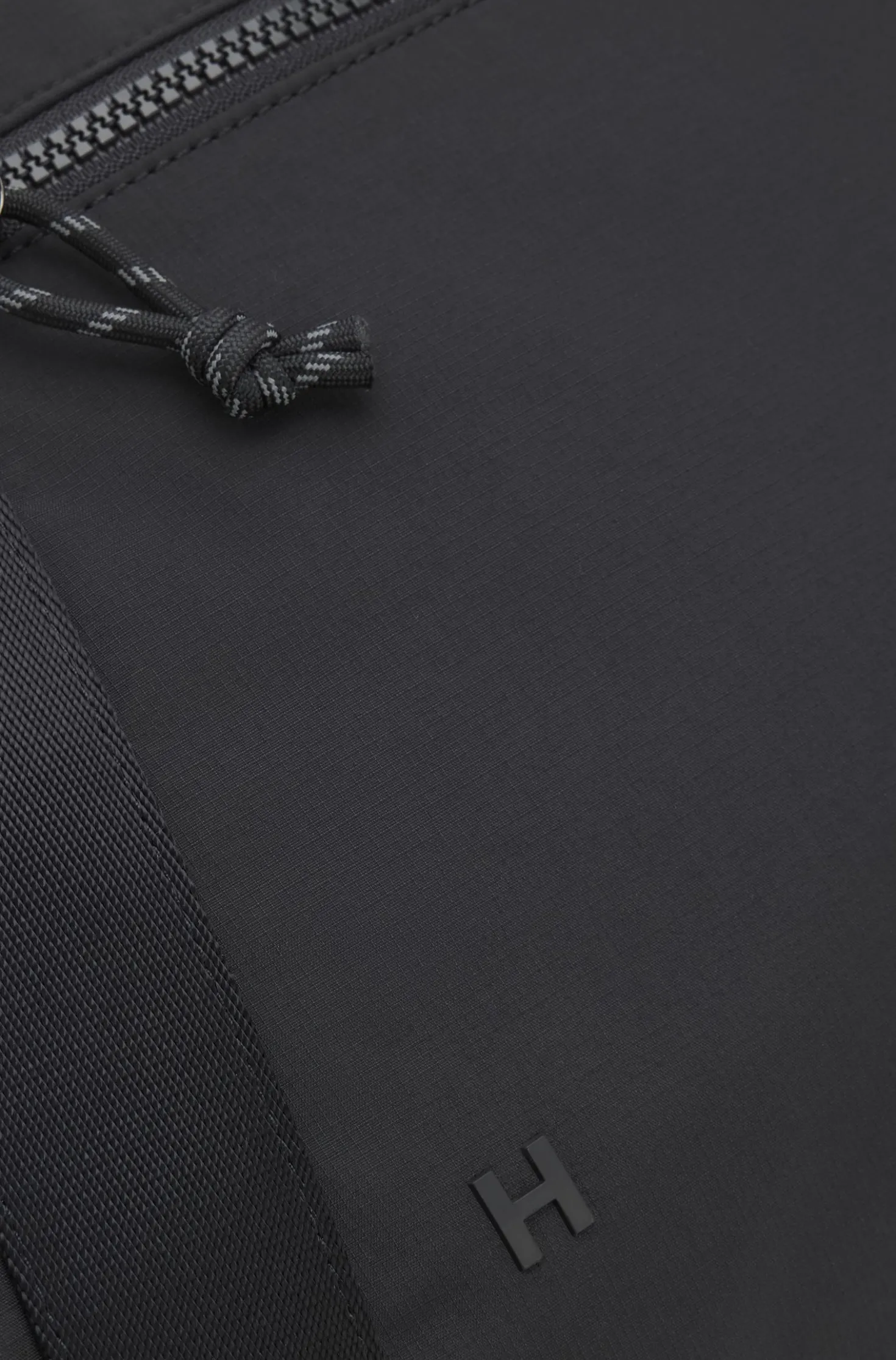 Holdall with wide-set logo detail