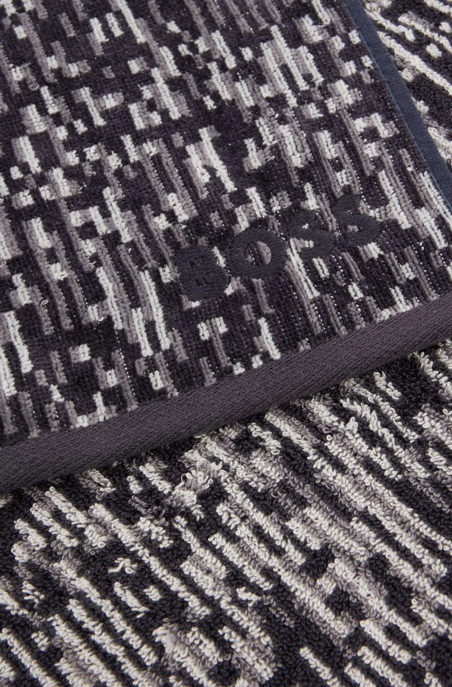Jacquard hand towel with sateen border by BOSS