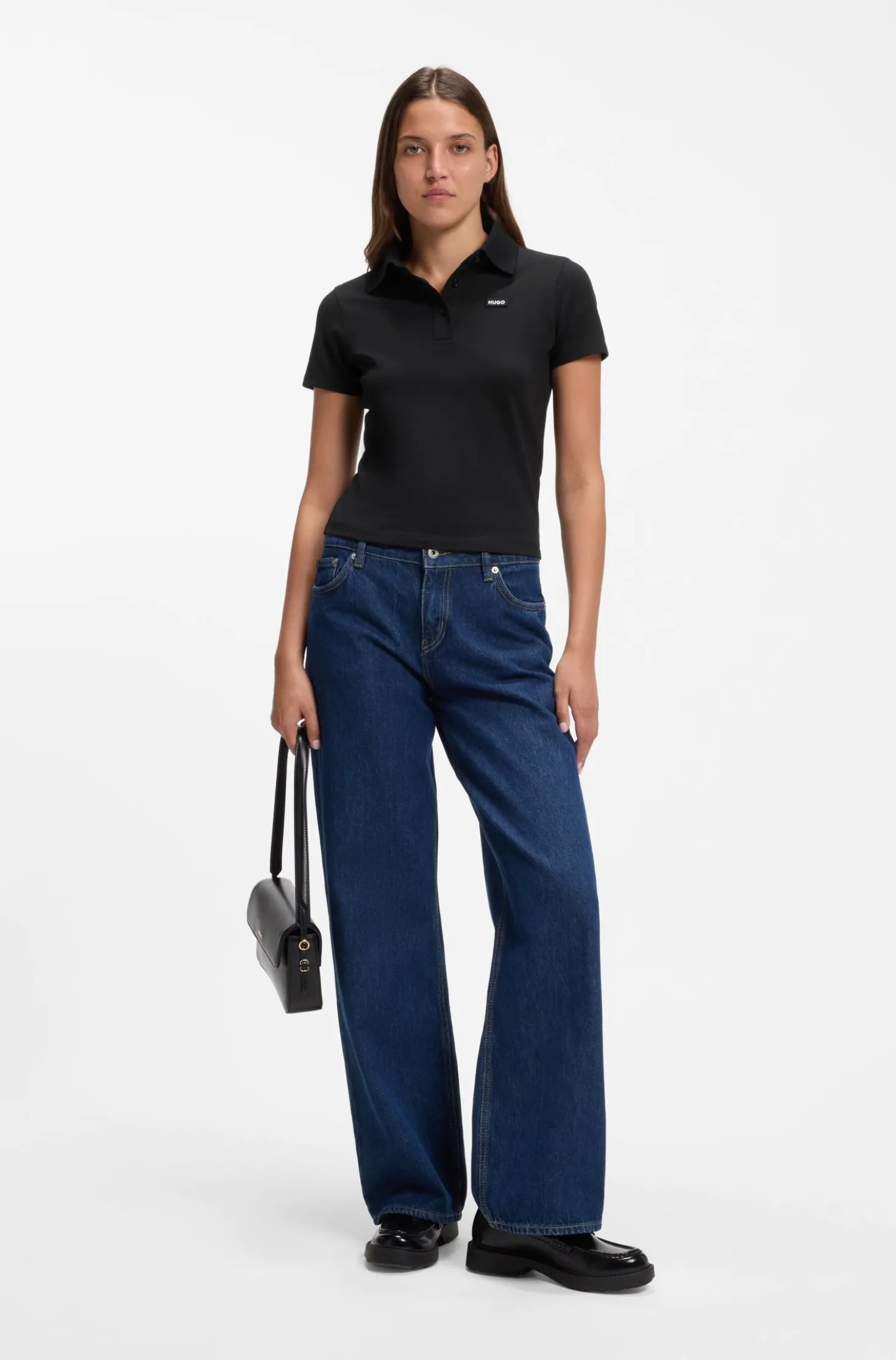 Knit polo in stretch-cotton piqué with logo badge