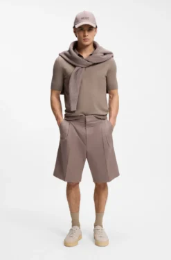 Knit polo with covered placket