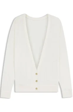 Knitted cardigan with rear button closure