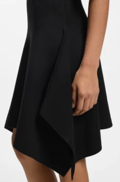 Knitted dress with shaped hemline