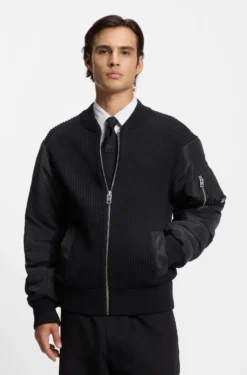 Knitted jacket with contrast sleeves