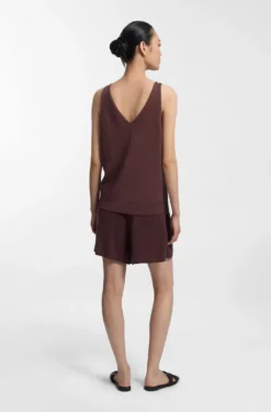 Knitted top with mixed structures