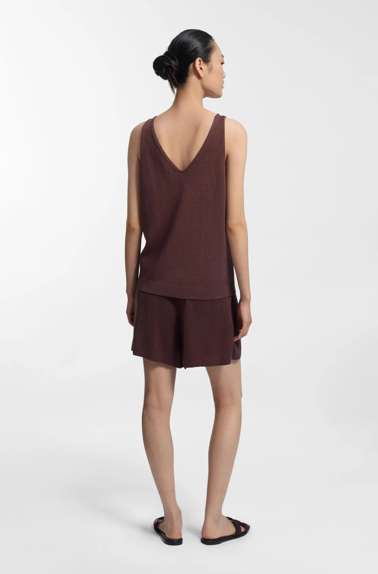 Knitted top with mixed structures