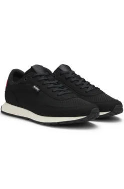 Knitted-upper trainers with logo flag