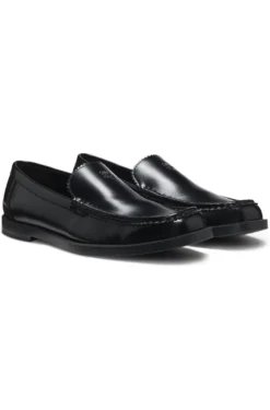 Leather moccasins with stacked logo
