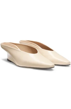 Leather mules with wedge heel