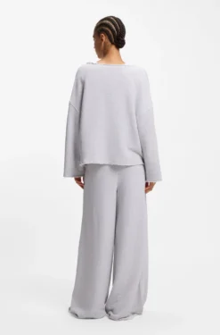 Loose-fit cotton-blend sweatshirt with raw-cut edges
