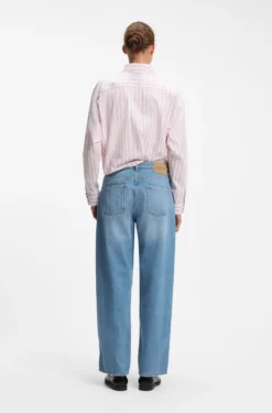 Loose-fit wide-leg jeans with charm accents