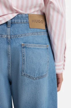 Loose-fit wide-leg jeans with charm accents