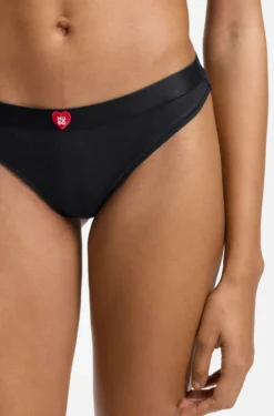 Low-rise ribbed thong with heart logo
