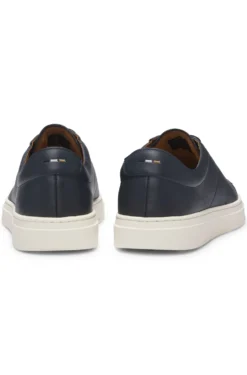 Low-top trainers in leather with embossed logo