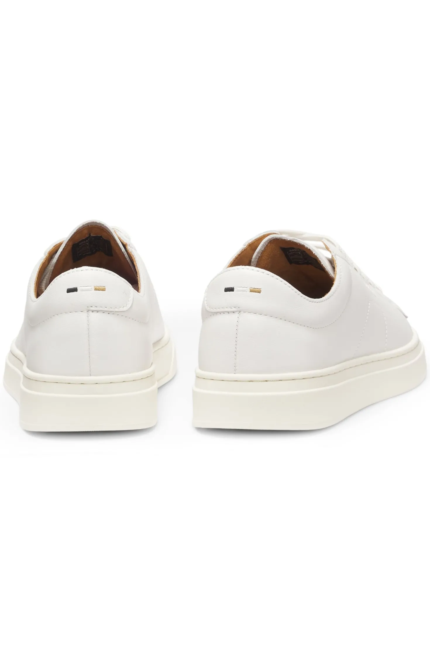 Low-top trainers in leather with embossed logo