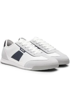Low-top trainers with structured trims