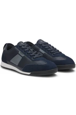 Low-top trainers with structured trims