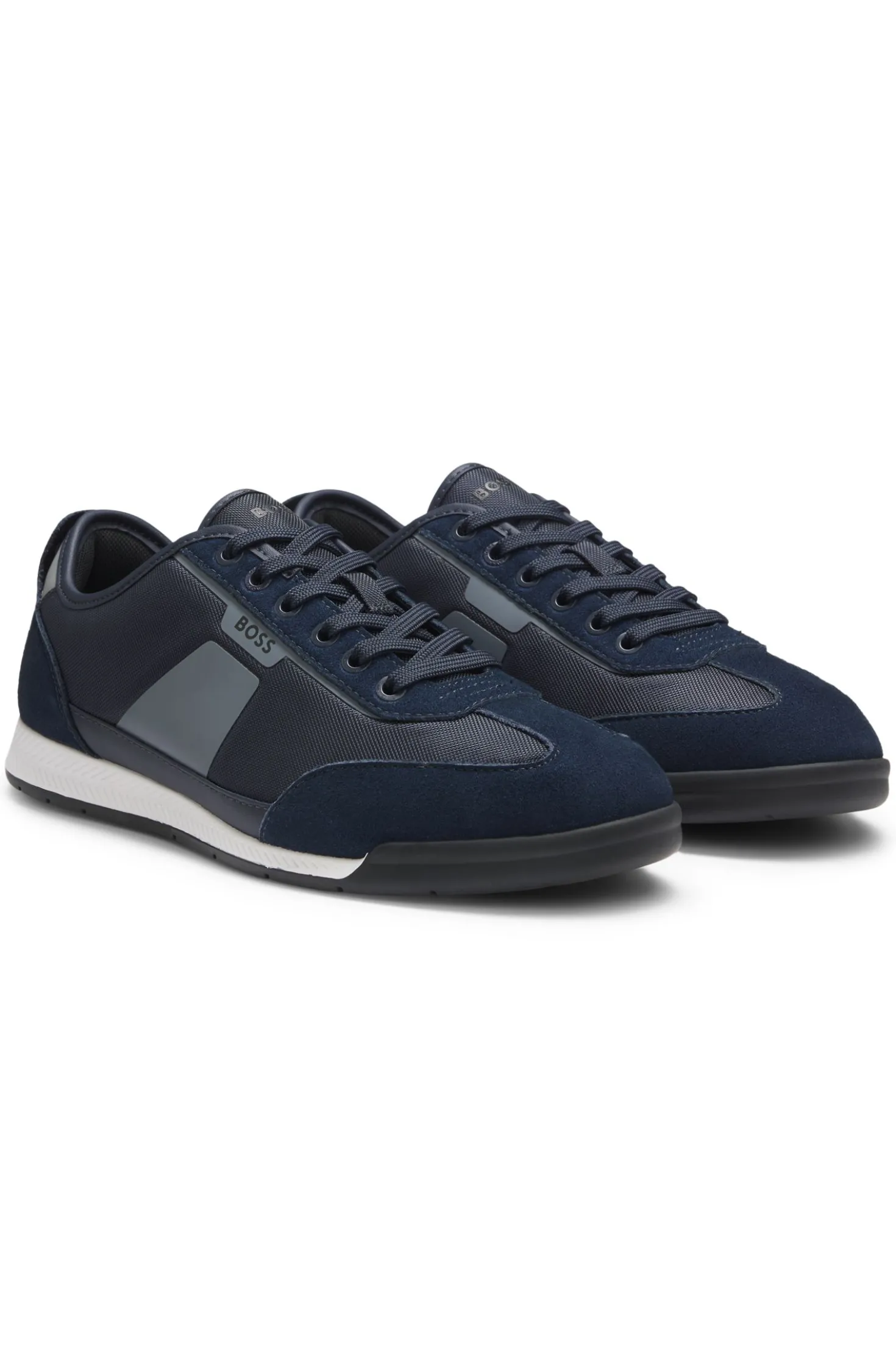 Low-top trainers with structured trims