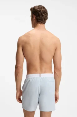 Medium-length swim shorts with contrast details