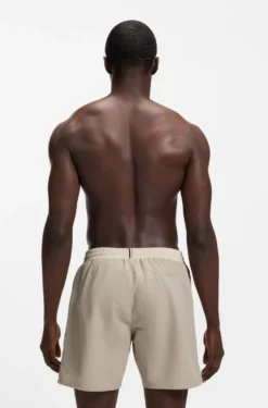Medium-length swim shorts with contrast details