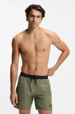 Medium-length swim shorts with contrast details