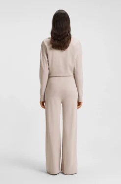 Melange-jersey tracksuit bottoms with logo plate
