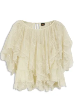 Mini cape blouse with lace trimmings